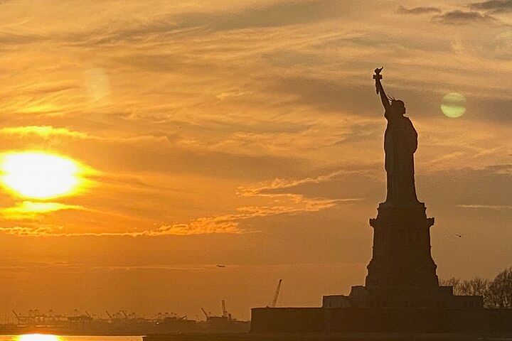 nyc statue of liberty night cruise and skyline