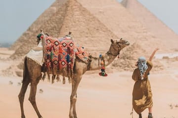 Giza Pyramids Day Tour with Camel Ride and Highlights