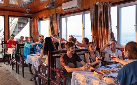 Halong Bay Day Cruise: Kayaking, Swimming, and Island Visit