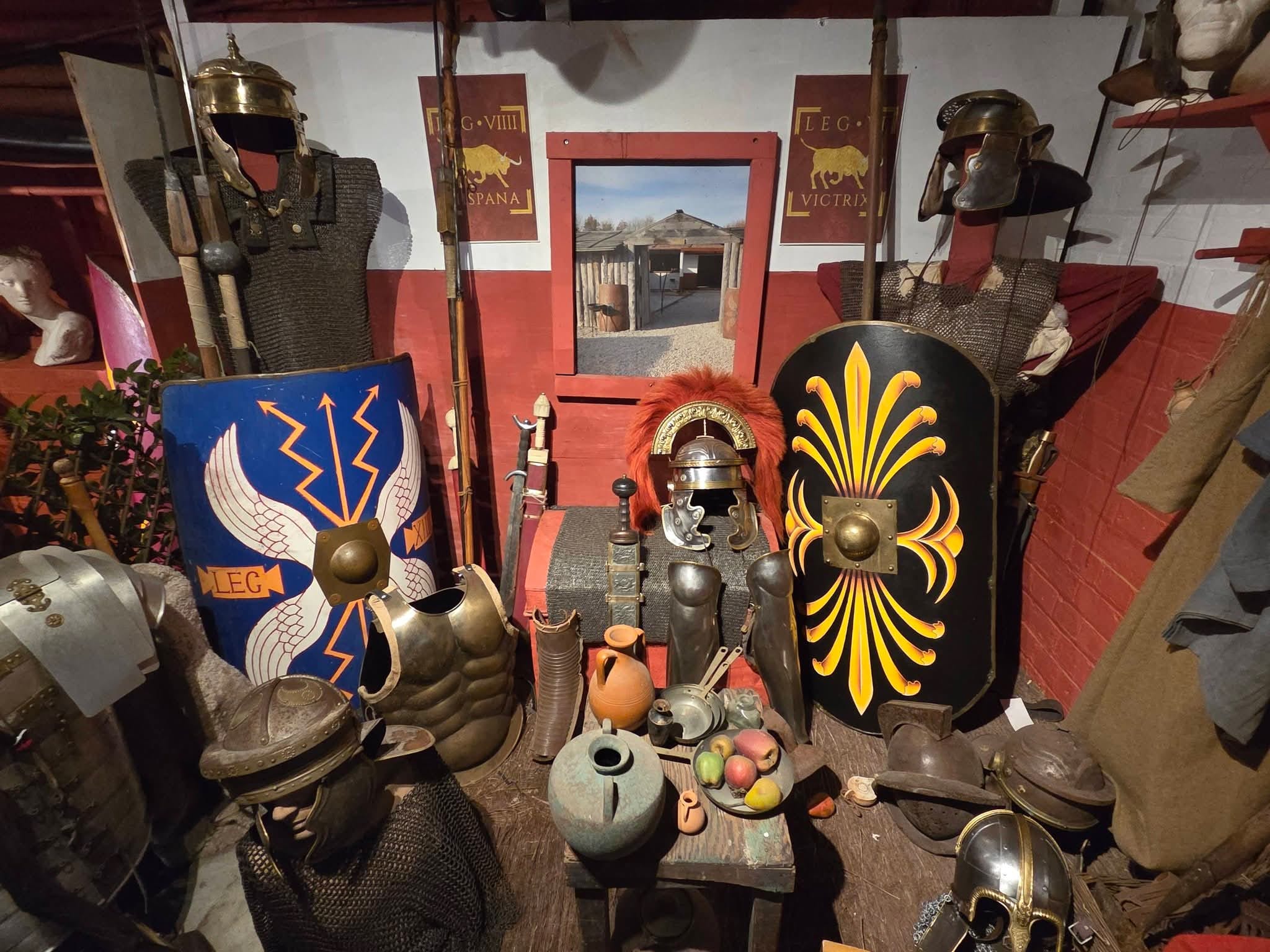 A display of fine Roman shields and weaponry, in the Roman Baths Museum, York.