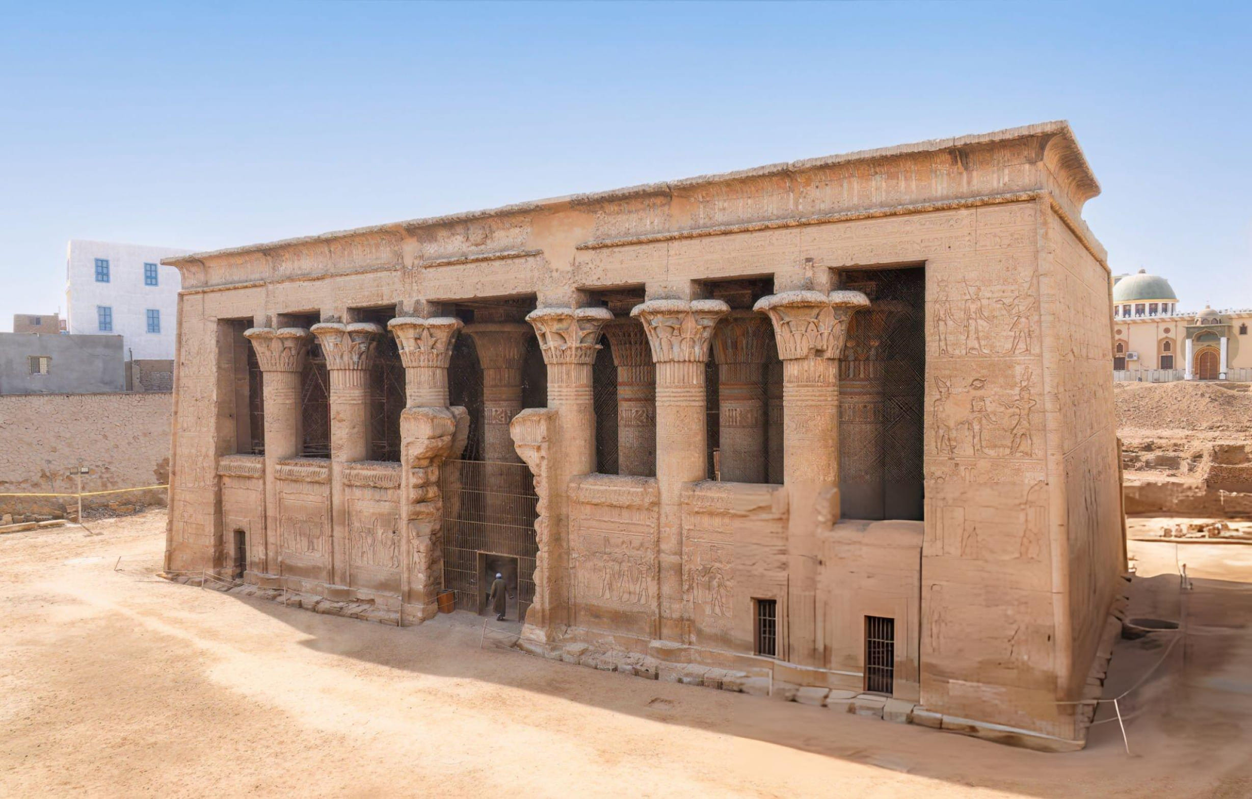 Colorful ancient Egyptian carvings and hieroglyphs inside Esna Temple