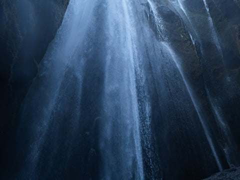 We sneak into a small canyon to see this waterfall, called Gljúfrabúi, or Canyon Dweller.