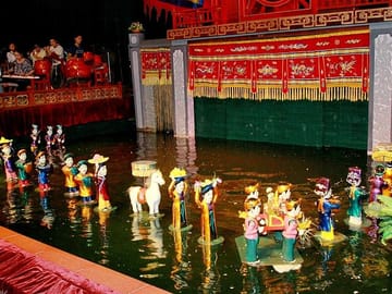 Water Puppet Show with Cyclo Ride and Dinner Cruise in Ho Chi Minh City