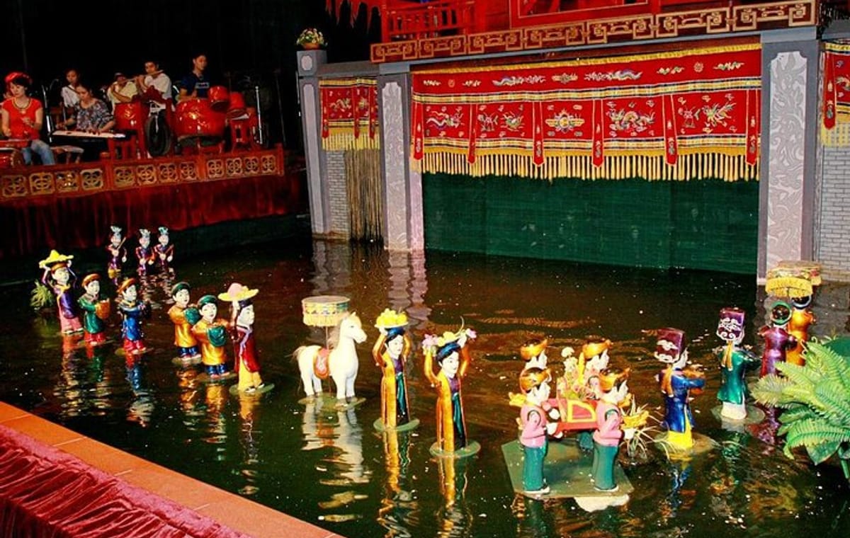 Water Puppet Show-Cyclo & Dinner On Cruise in Ho Chi Minh City