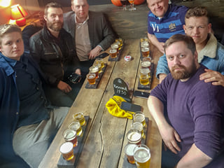 A group of travellers during a beer sampling