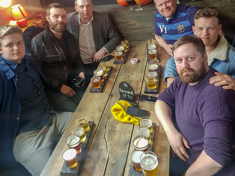A group of travellers during a beer sampling