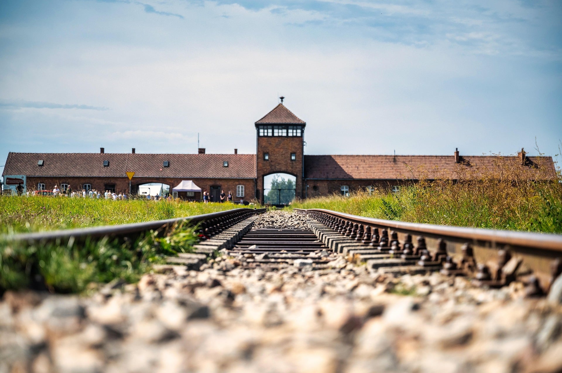 Railway tracks leading to the main entrance gatehouse at Auschwitz II-Birkenau