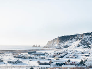 Looking over the village of Vík and Reynisdrangar seastacks