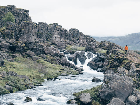 Öxará river running down into Almannagjá fissure at Þingvellir National Park Iceland