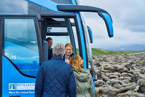People entering reykjavik sightseeing bus