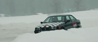 Driving a rally car on an ice track 1h . 2
