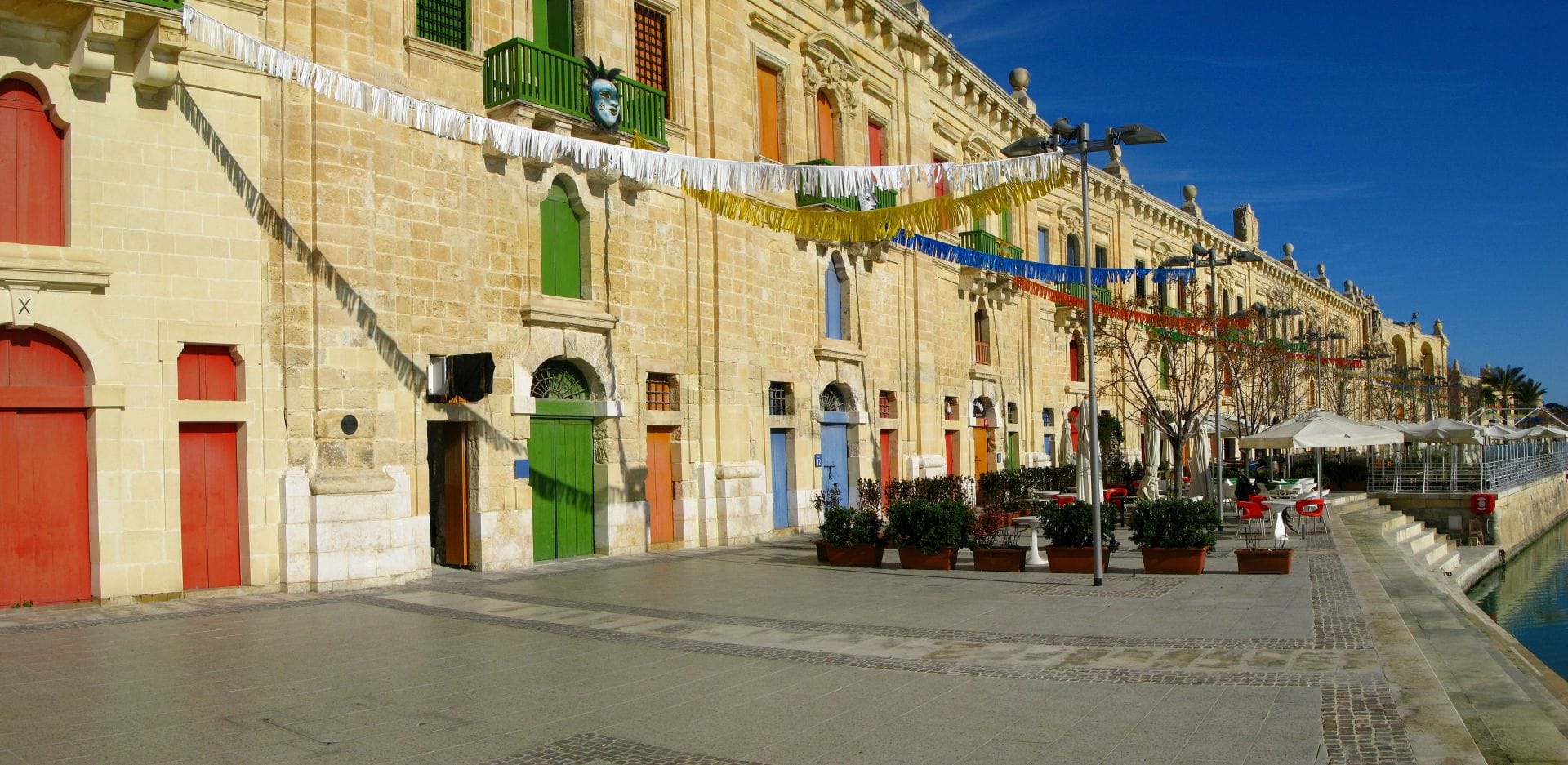 Enjoy a break with tasty food at one of the restaurants at Valletta Waterfront a promenade in Floriana, Malta