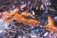 Image of Dubai skyline at sunset from Burj Khalifa SKY.