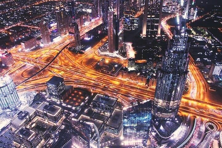 Image of Dubai skyline at sunset from Burj Khalifa SKY.
