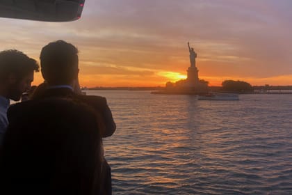 Sunset Skyline Cruise Near Statue of Liberty in New York