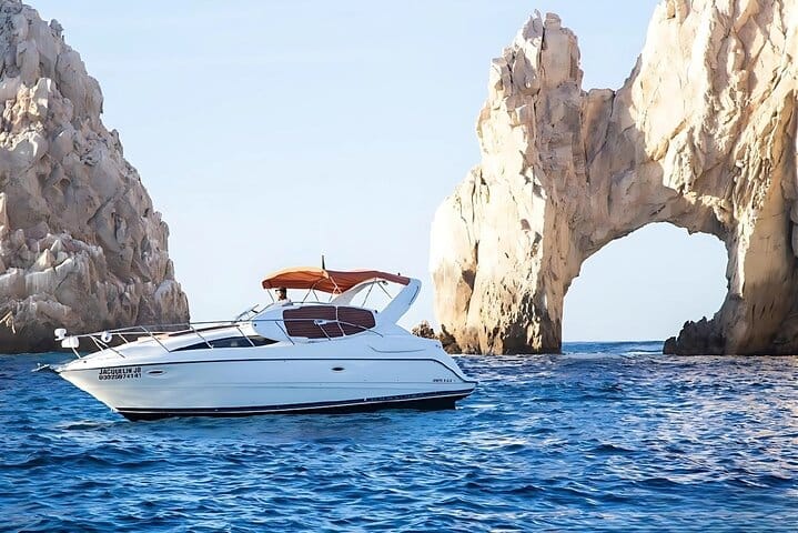 Enjoy the exclusive luxury of cruising past El Arco on your private yacht.