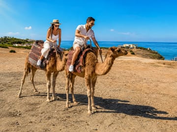 Camel ride experience near Tangier with sea views and outdoor scenery