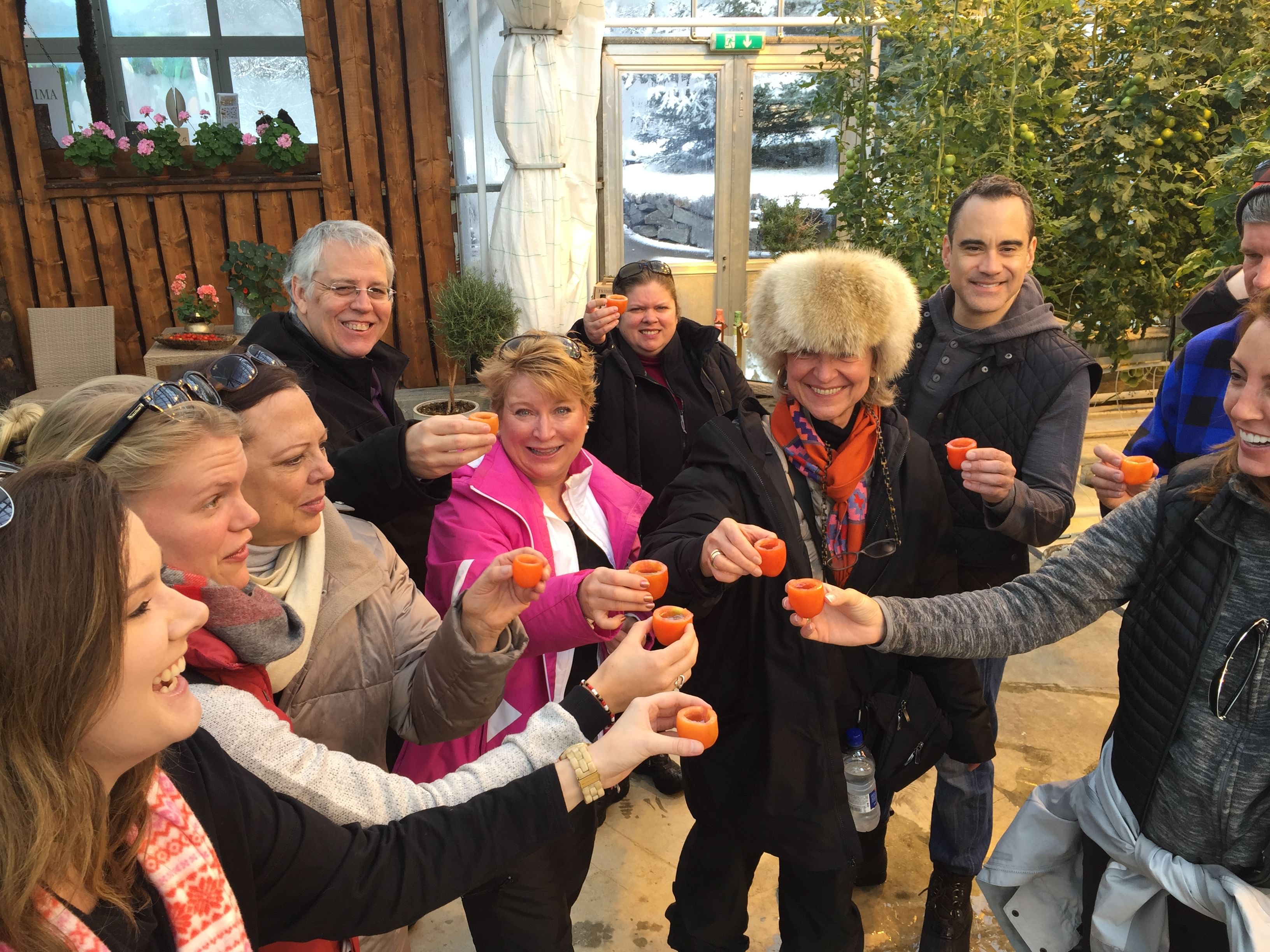 Making a toast with tomato glasses