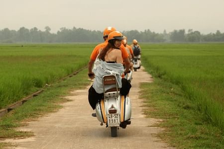 Hanoi Outskirts And Co Loa Countryside Half Day Tour by Vespa