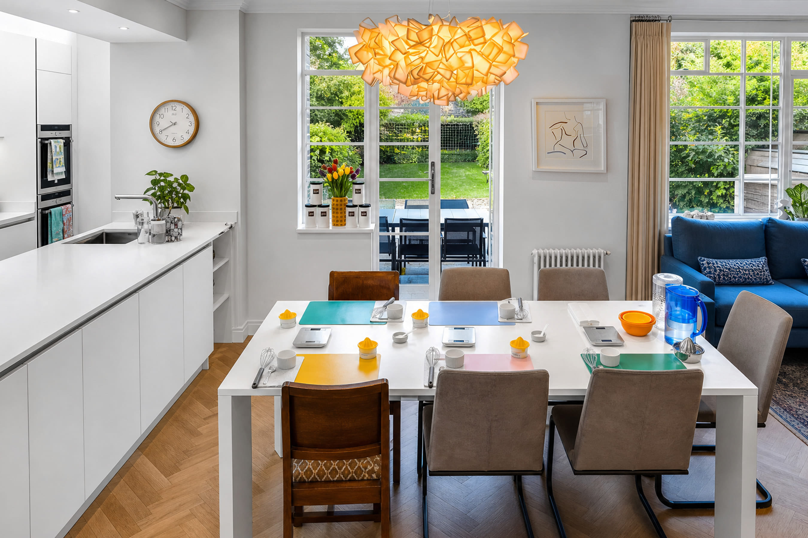 A photo of a table and kitchen the experience is hosted around