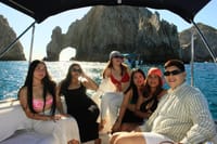 Combine sightseeing and adventure: Cruise past Pelican Rock and the Arch, then jump in for some amazing snorkeling!