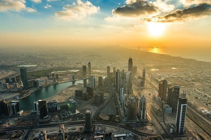Image of Dubai skyline at sunset from Burj Khalifa SKY.