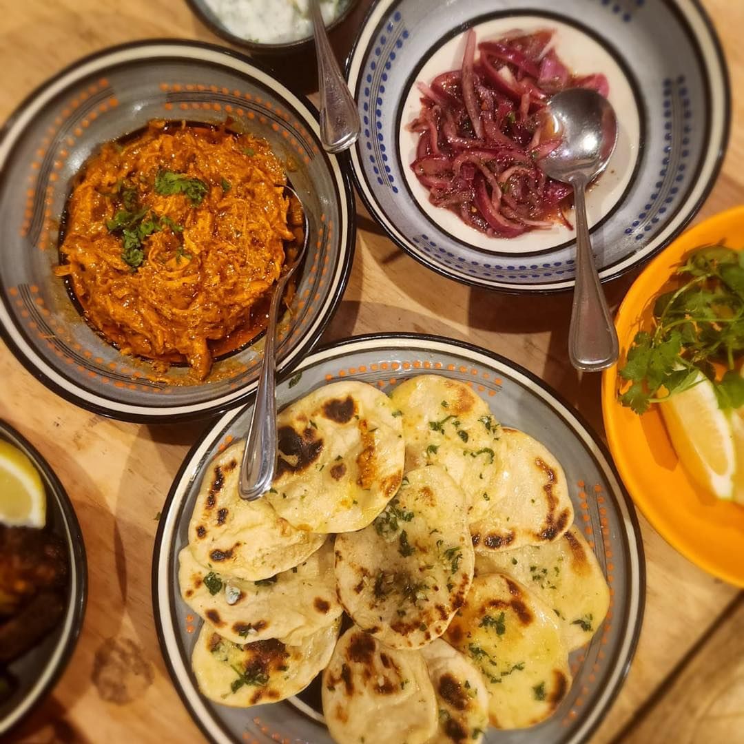 Plates of freshly made Cape Malay dishes at the Cape Malay Cooking Experience.