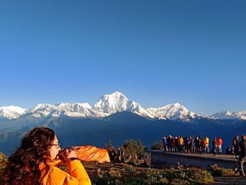 Beautiful view of Poon Hill with a cup of tea