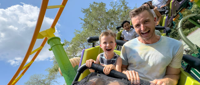 Guests on Trolls Trollercoaster in DreamWorks Land at Universal Studios Florida