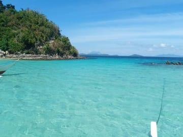 Puerto princesa pick up to portbarton island hopping