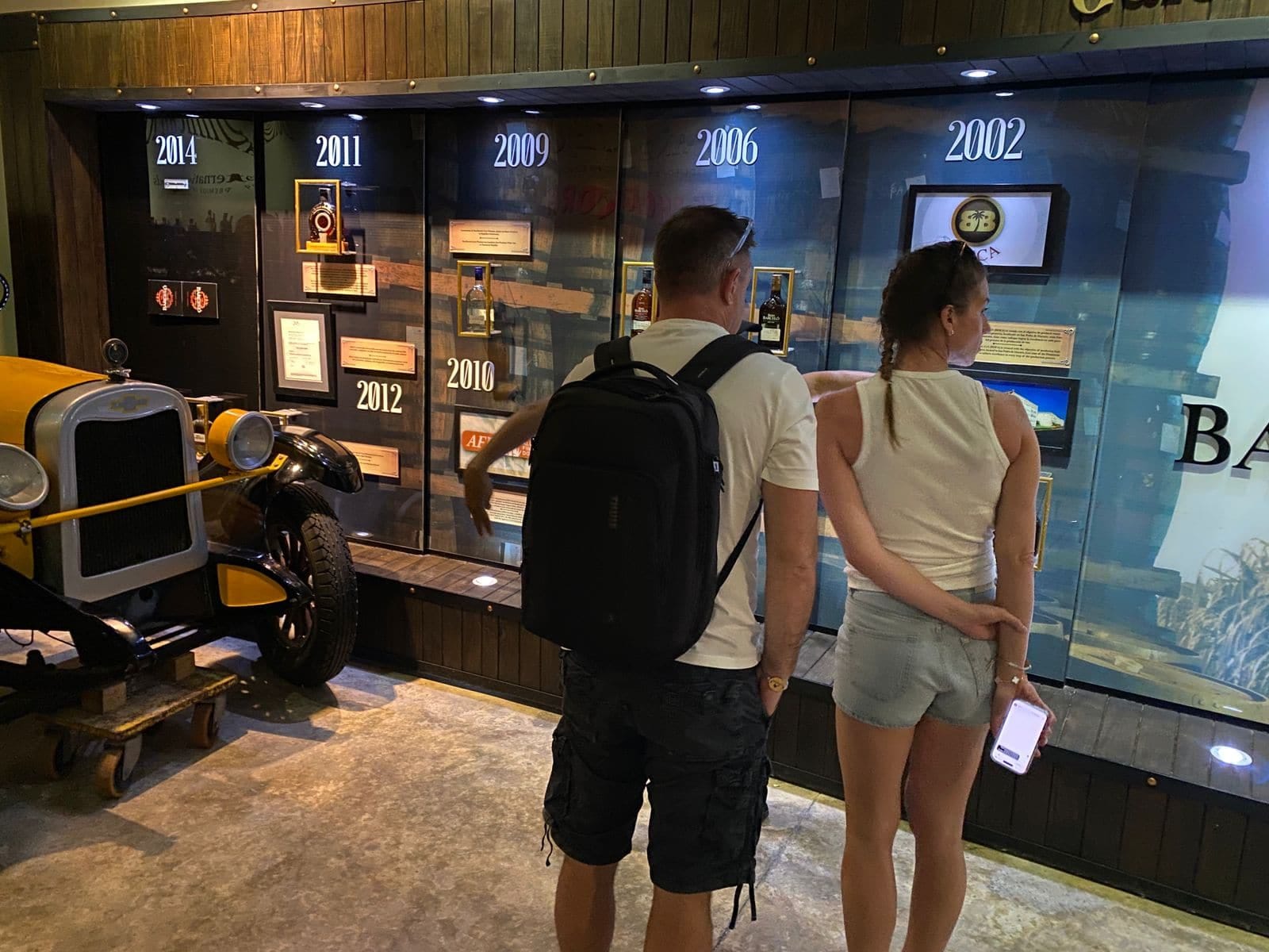 Couple touring the historic Ron Barceló exhibition at the Ron Barceló Historic Center.