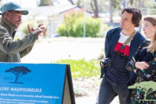 Engage with the vibrant culture of Masiphumelele as you cycle alongside passionate guides and fellow explorers.