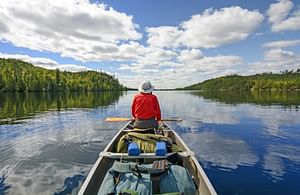 Canoeing trip with Reindeer Farm and Husky Farm visit