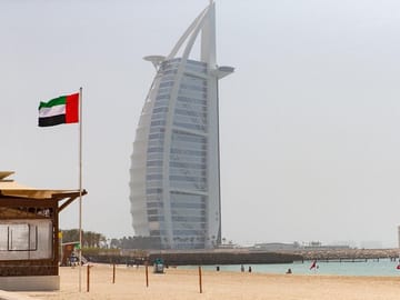 Burj Al-Arab hotel, set on its own island in Dubai, has a sail shape and is one of the tallest hotels in the world.