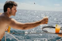 Raise a glass to adventure! Enjoy tropical cocktails while cruising the sparkling waters of Los Cabos on a private catamaran.