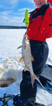 Arctic Ice Fishing by Snowshoe