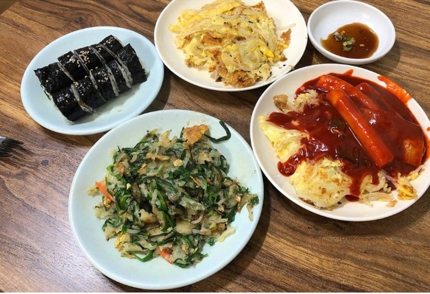 Korean street food from Matna Bunsik, known for serving BTS Jimin’s go-to meals.