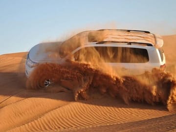 Dubai Desert Safari with BBQ Dinner and Camel Ride Experience