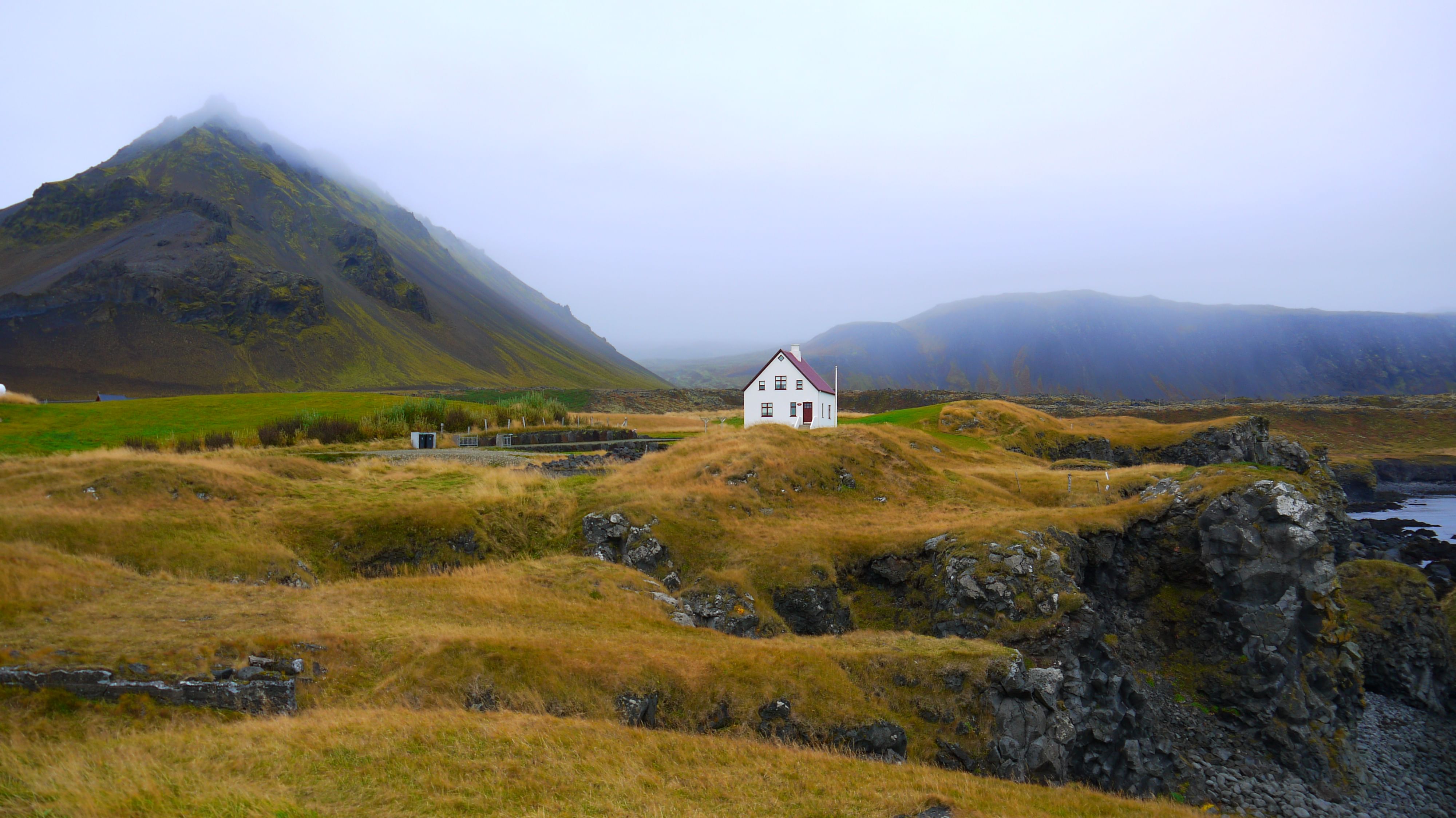 Lone house in Iceland landscape. South coast and northern lights tour