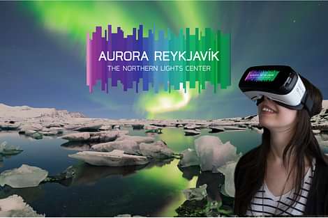 Northern Lights over Iceland; visitor to Aurora Reykjavík wearing the VR headset with 360° Northern Lights
