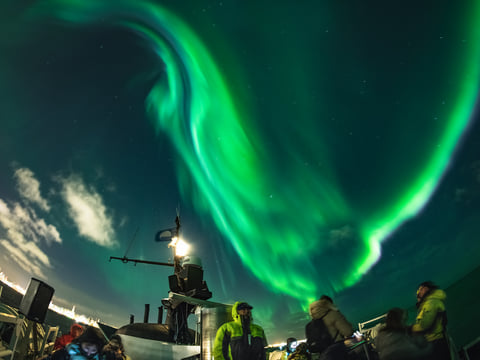 Northern Lights by Boat