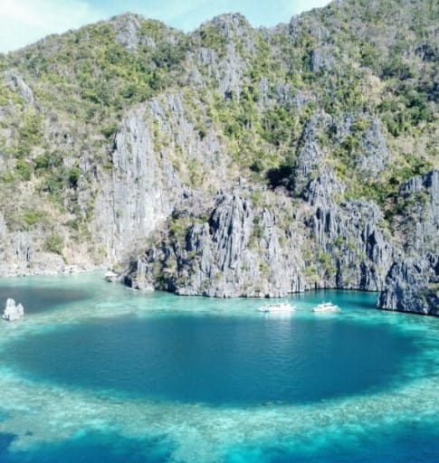 Travelers exploring Coron Island Tour A highlights, including Kayangan Lake, Twin Lagoon, and vibrant coral reefs.