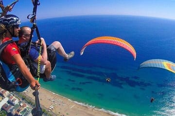 Tandem Paragliding with a Licensed Pilot from Side