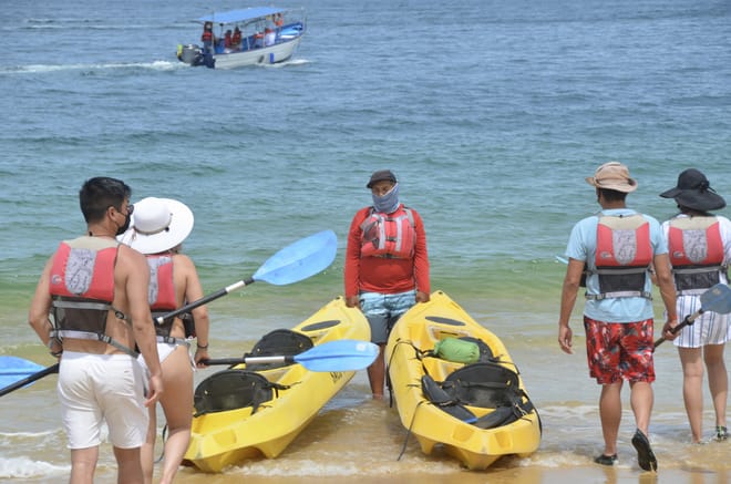 kayak tour los cabos beach start sea of cortez yellow kayaks guide tourists preparing adventure.