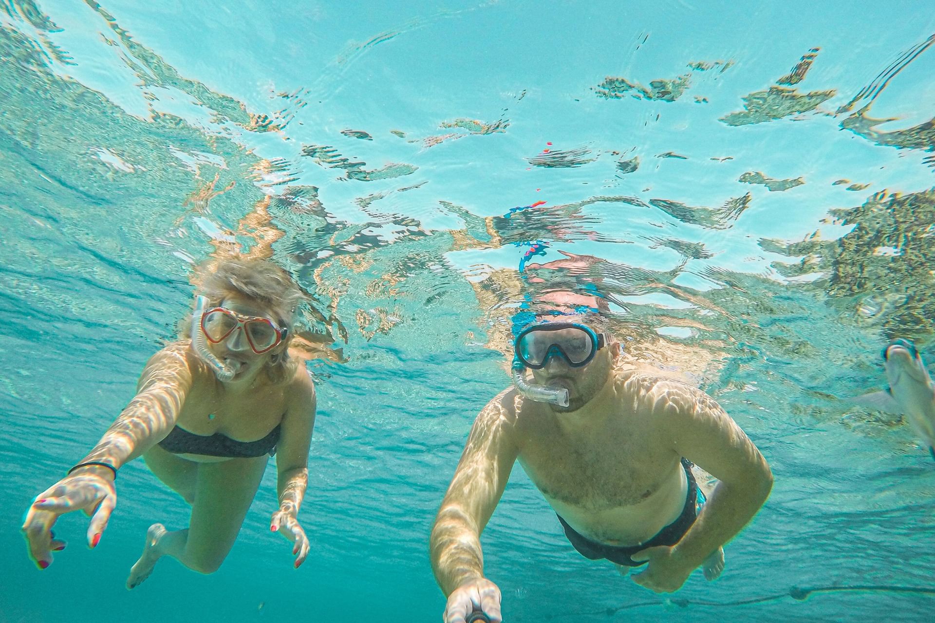 Romantic couple snorkeling at Fuik Bay Curacao