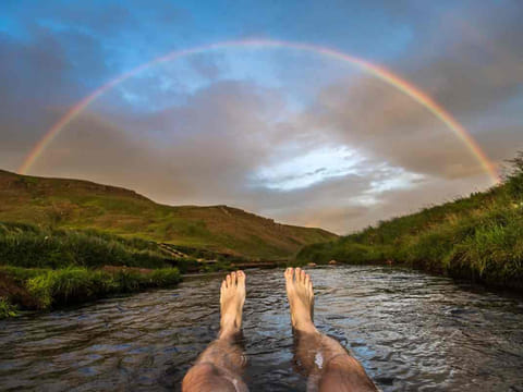 soaking into the hot river