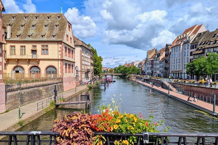 View from Pont du Corbeau of Quai des Bateliers and the former Great Butcher's Shop (Historical Museum).