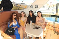 Enjoy the luxurious seating and social area below deck on your private yacht.