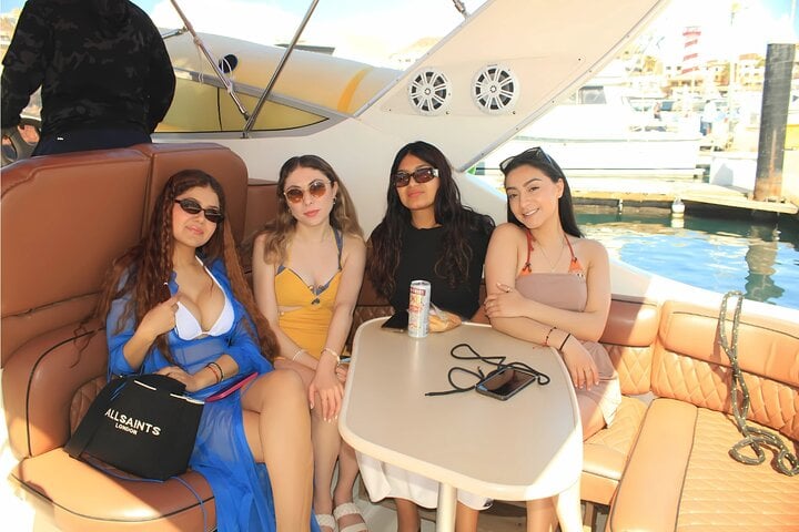 Enjoy the luxurious seating and social area below deck on your private yacht.