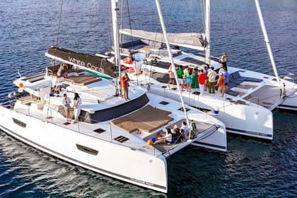 Mykonos: Brand-New Catamaran Cruise with Meal, Drinks & Transport